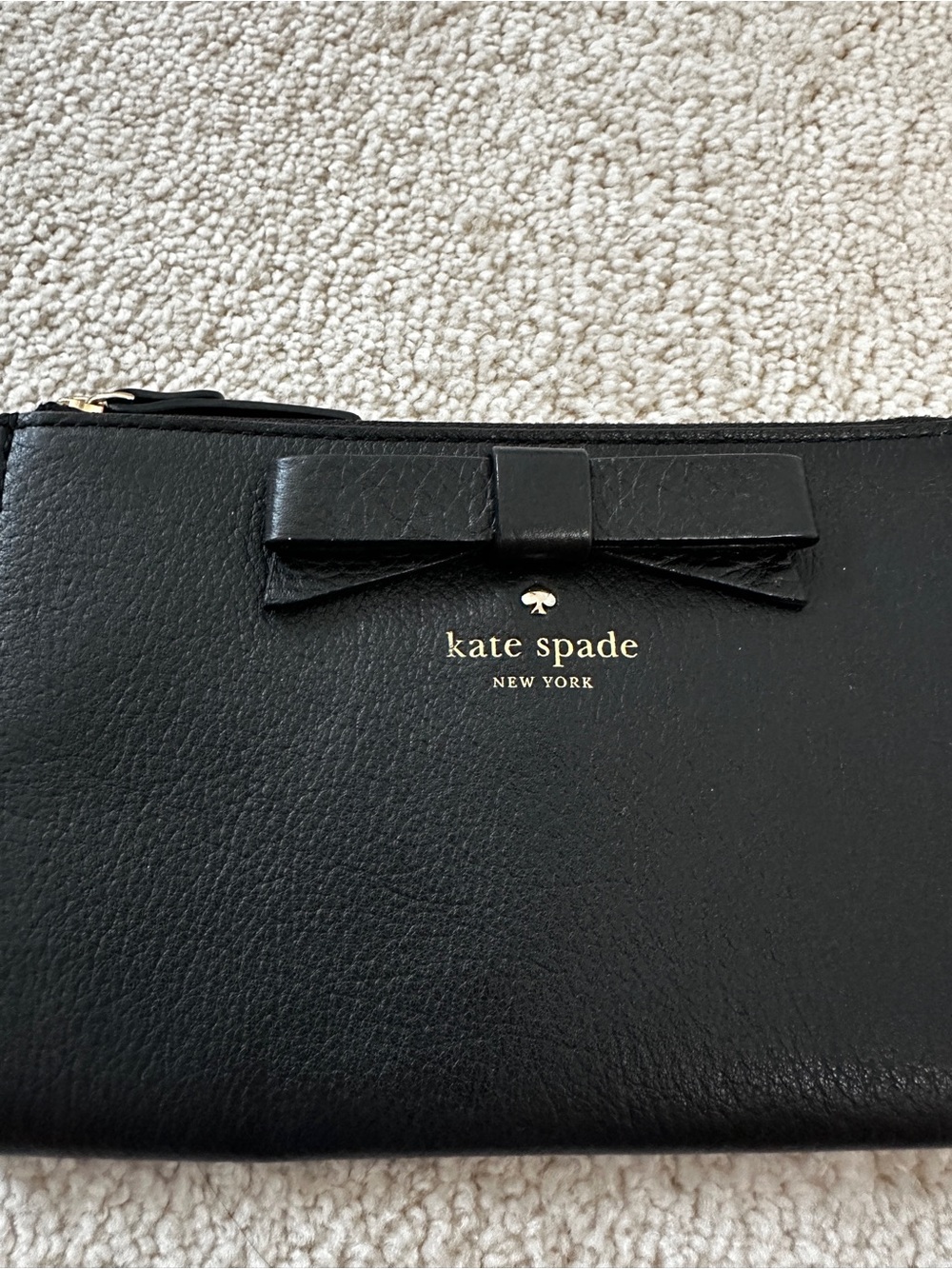 kate spade Black Leather Bow Wristlet with Gold Logo